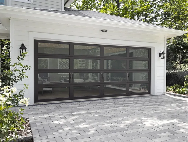 Pineville Garage Door Repair design specialist presenting custom garage door options to Pineville homeowner