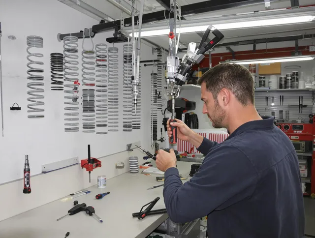 Pineville Garage Door Repair safety certified technician performing precision spring replacement in Pineville